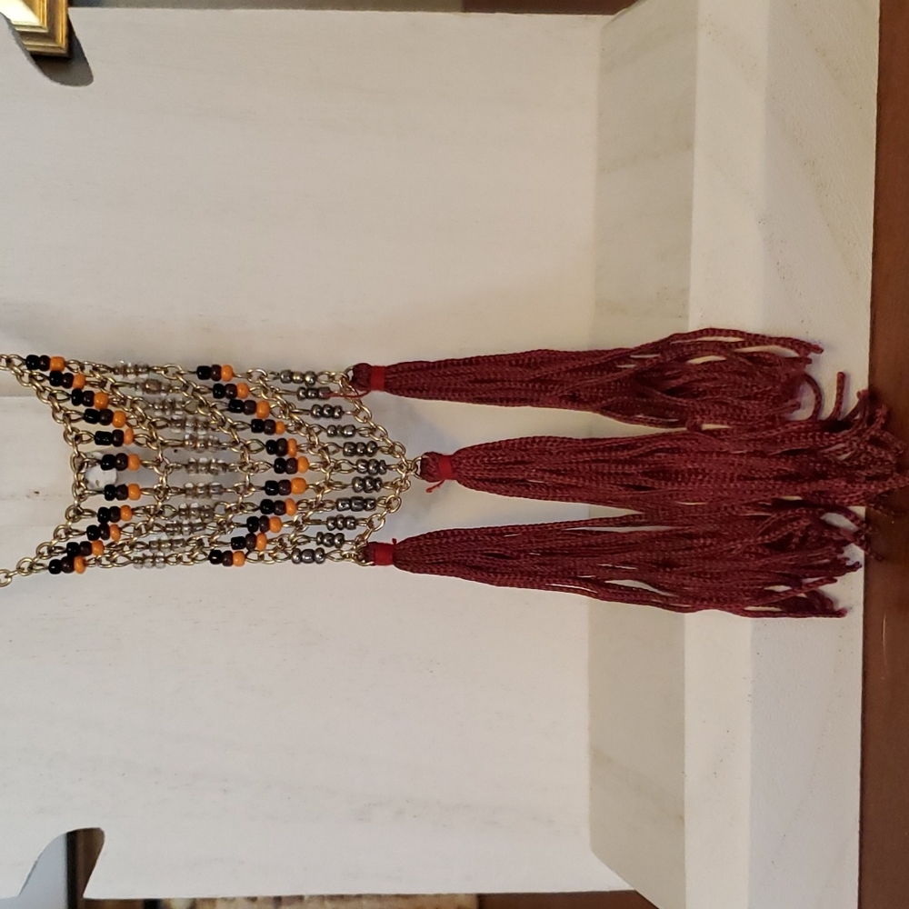 Long bead and tassel necklace